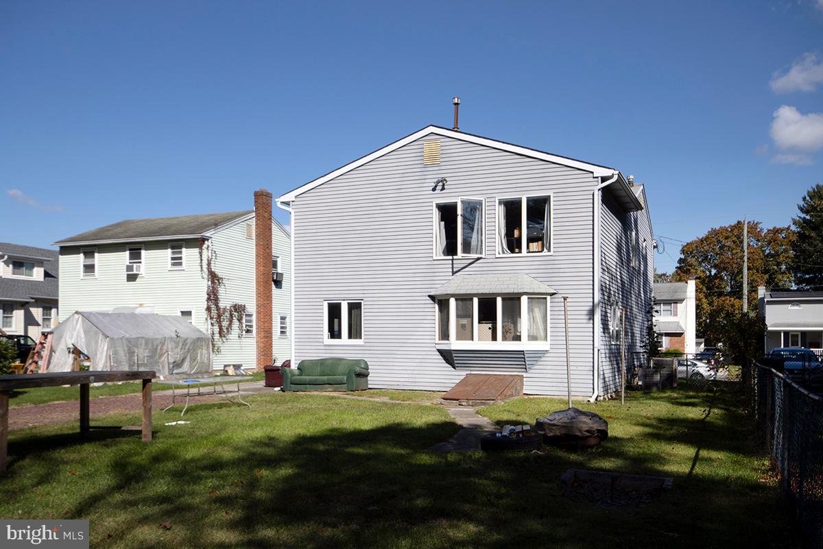 8 Franklin Road Glassboro, NJ 08028 - Photo 38 of 40 a view of a house with backyard and sitting area