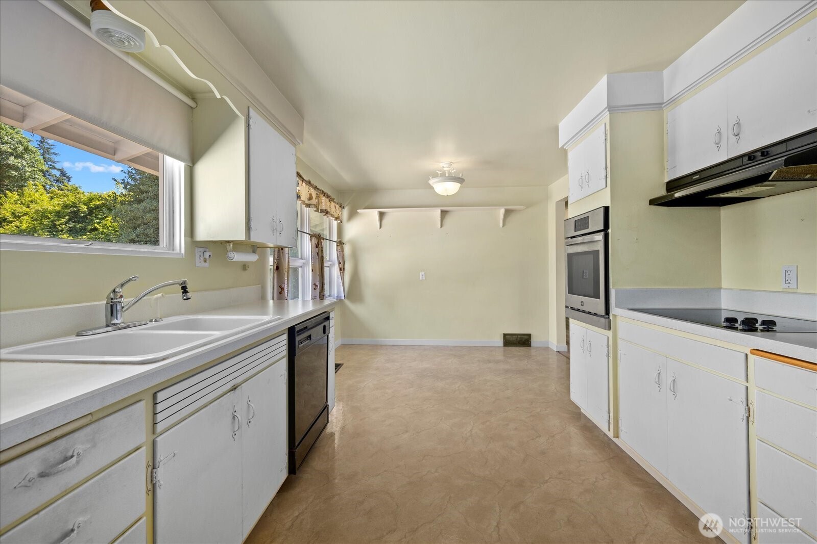 9125 Meadow Way Everett, WA 98208 - Photo 13 of 27 a bathroom with a double vanity sink and mirror