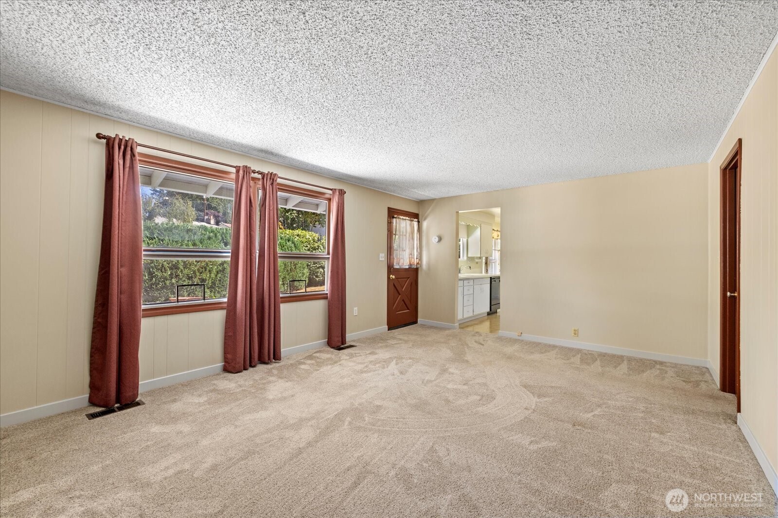 9125 Meadow Way Everett, WA 98208 - Photo 16 of 27 an empty room with windows