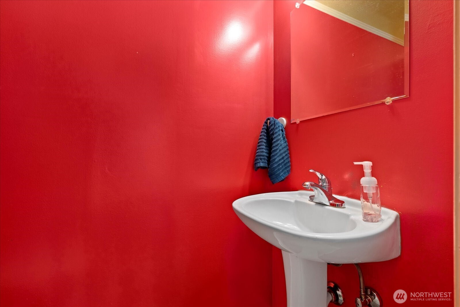 9125 Meadow Way Everett, WA 98208 - Photo 24 of 27 a bathroom with a sink and a mirror