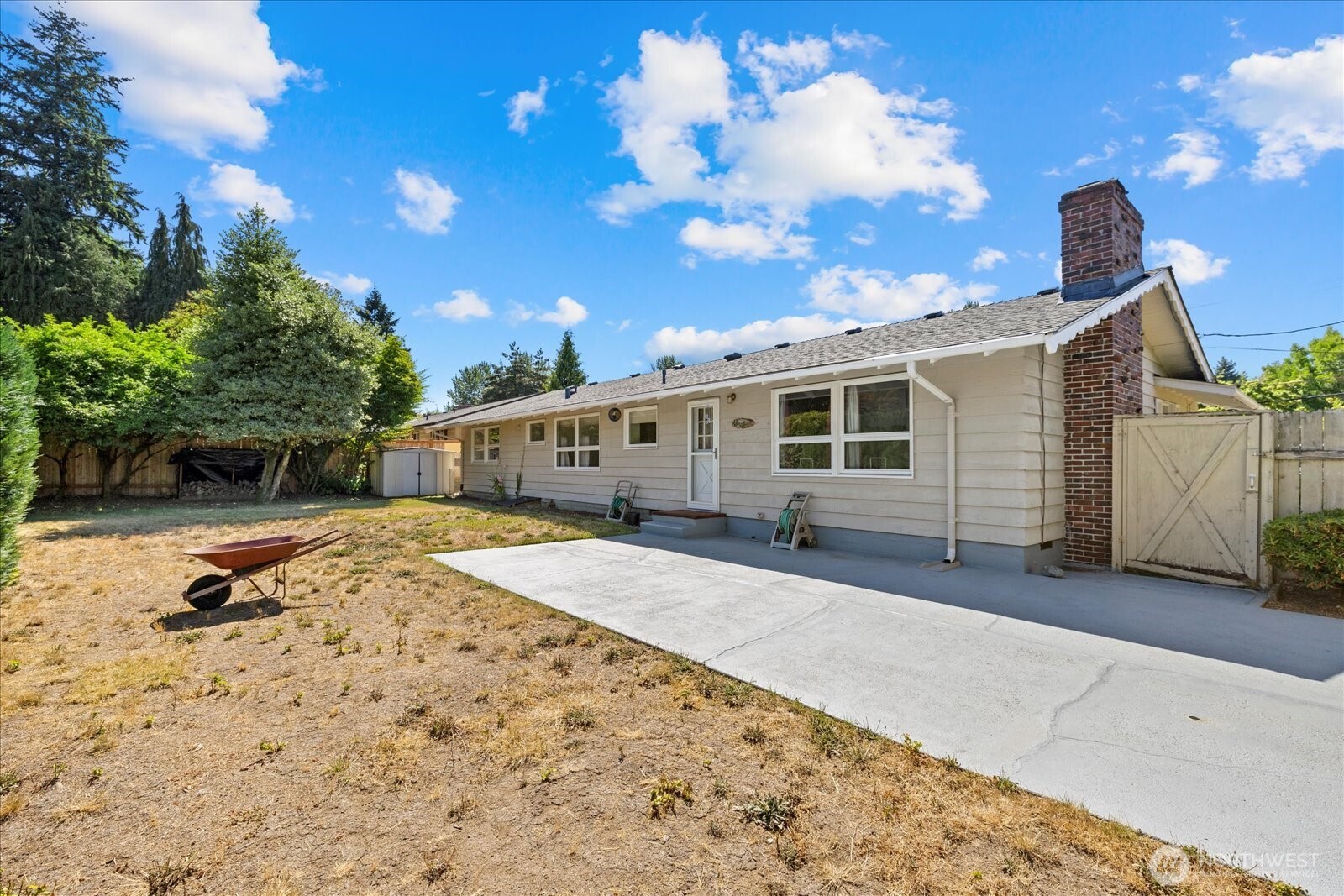 9125 Meadow Way Everett, WA 98208 - Photo 27 of 27 a front view of a house with a yard and garage