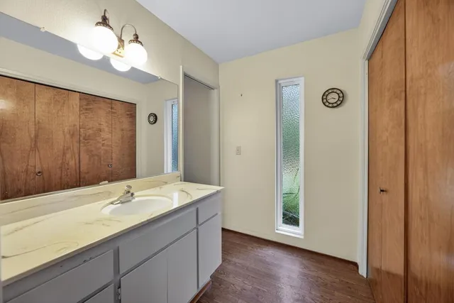 a view of an empty room with a large window