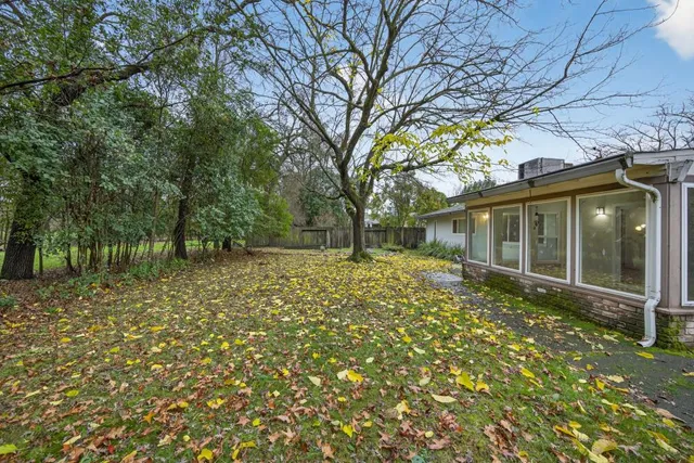 a view of a house with a garden