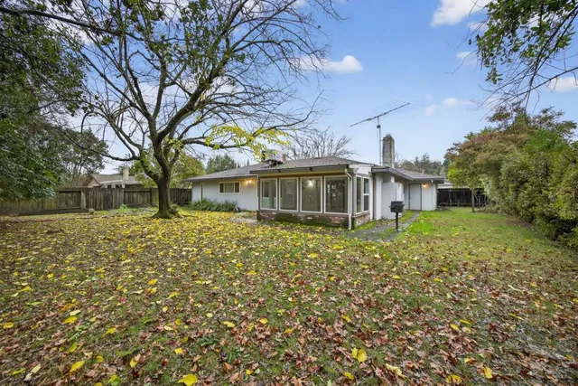 a backyard of a house with lots of green space