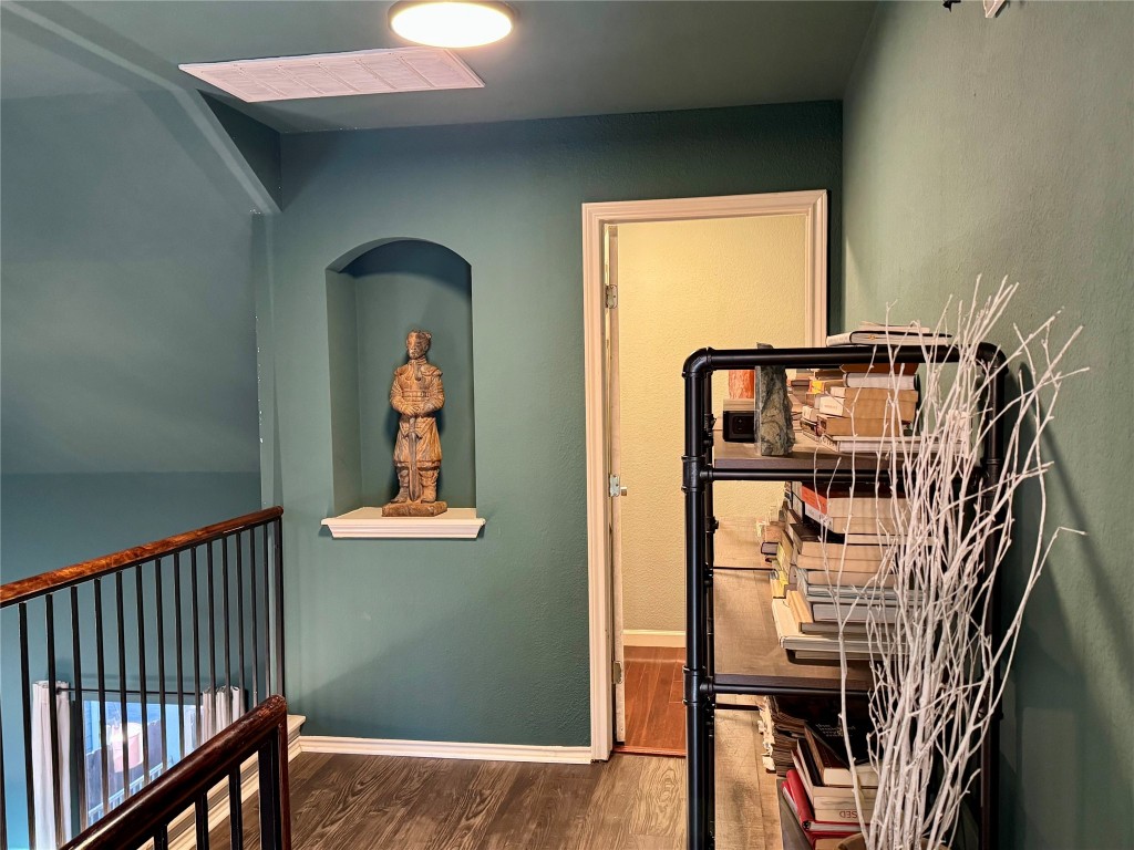 2308 Sweet Clover Drive Austin, TX 78745 - Photo 16 of 30 a view of staircase with railing and a window