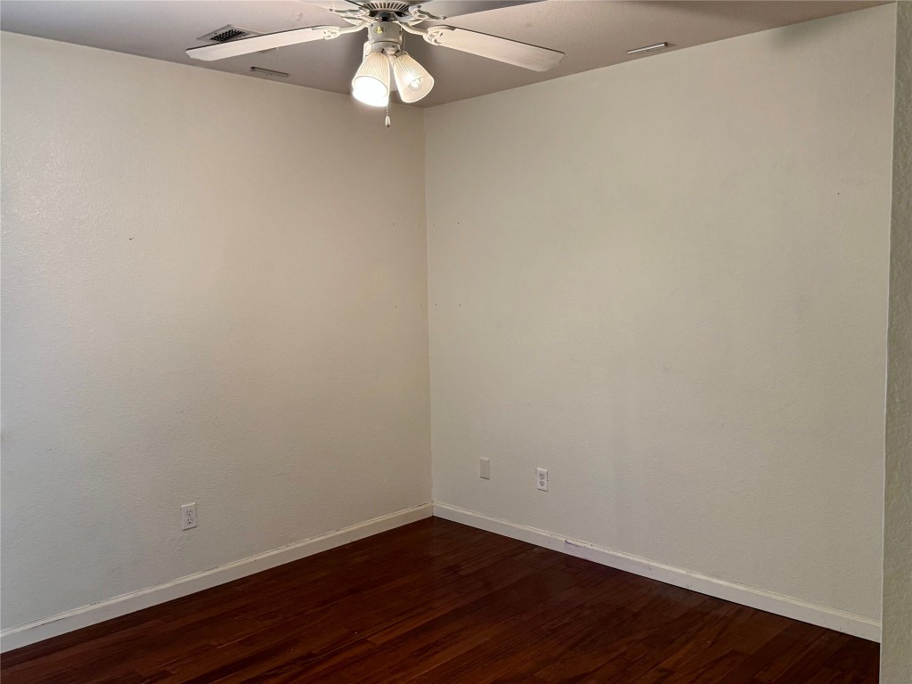 2308 Sweet Clover Drive Austin, TX 78745 - Photo 23 of 30 a view of a small space with wooden floor and closet