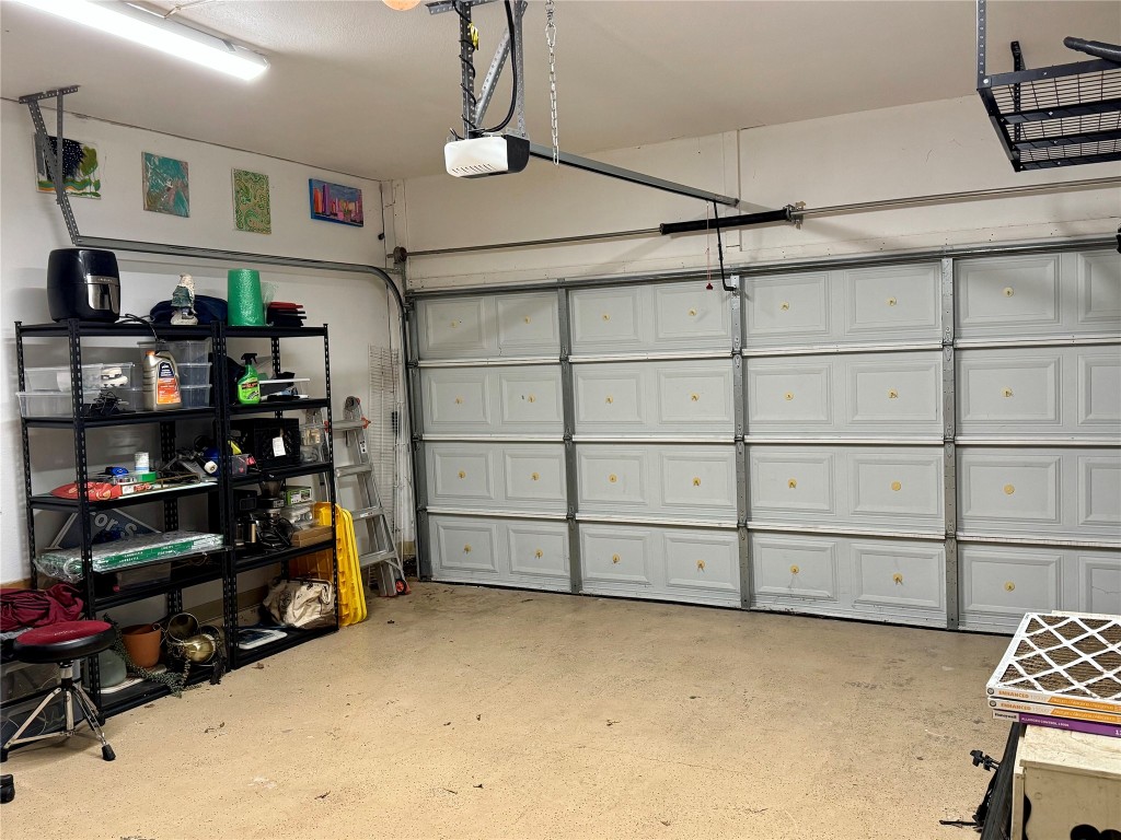 2308 Sweet Clover Drive Austin, TX 78745 - Photo 30 of 30 a view of a garage with storage