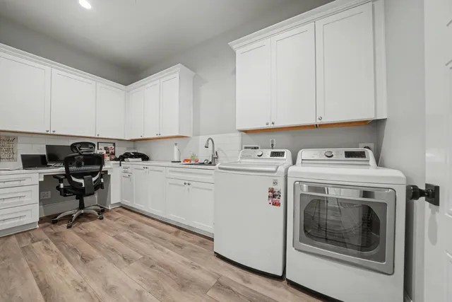 a bedroom with a bed and a table in it