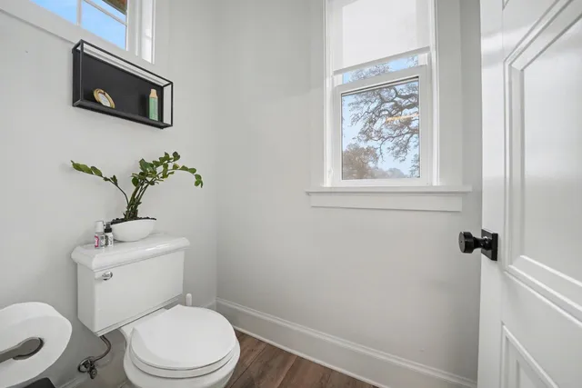 a bedroom with a bed and a view of bedroom