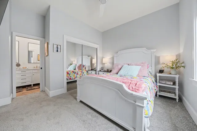 a bathroom with a granite countertop sink mirror and a