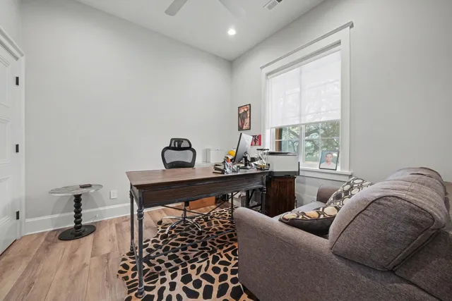 a view of a garage with rack and bicycle