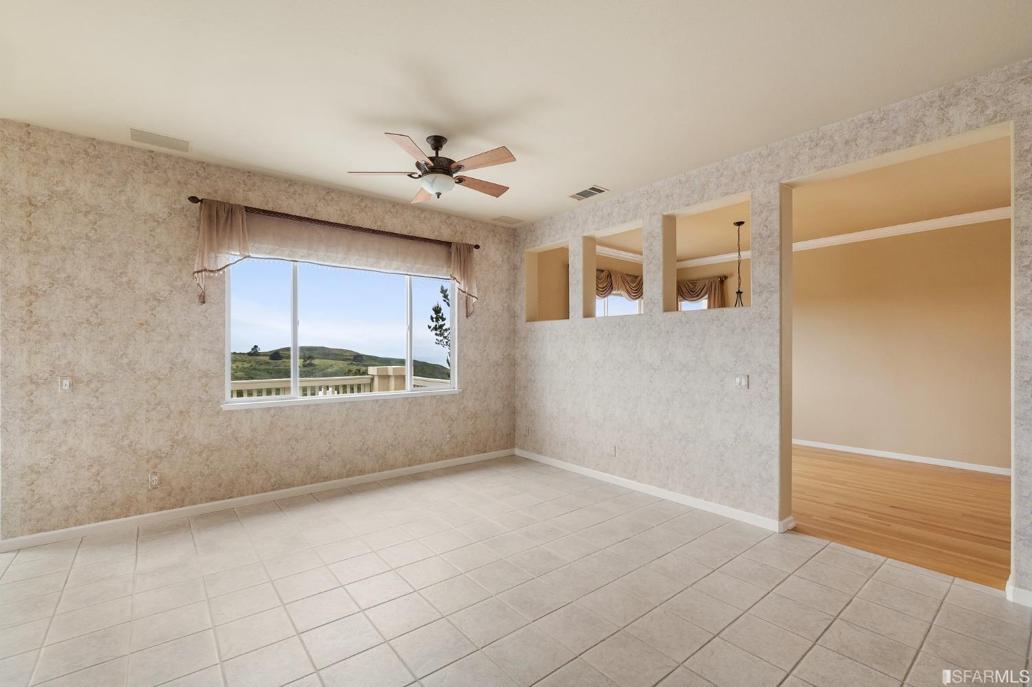 211 Sunset Court Pacifica, CA 94044 - Photo 16 of 84 an empty room with a empty space and windows