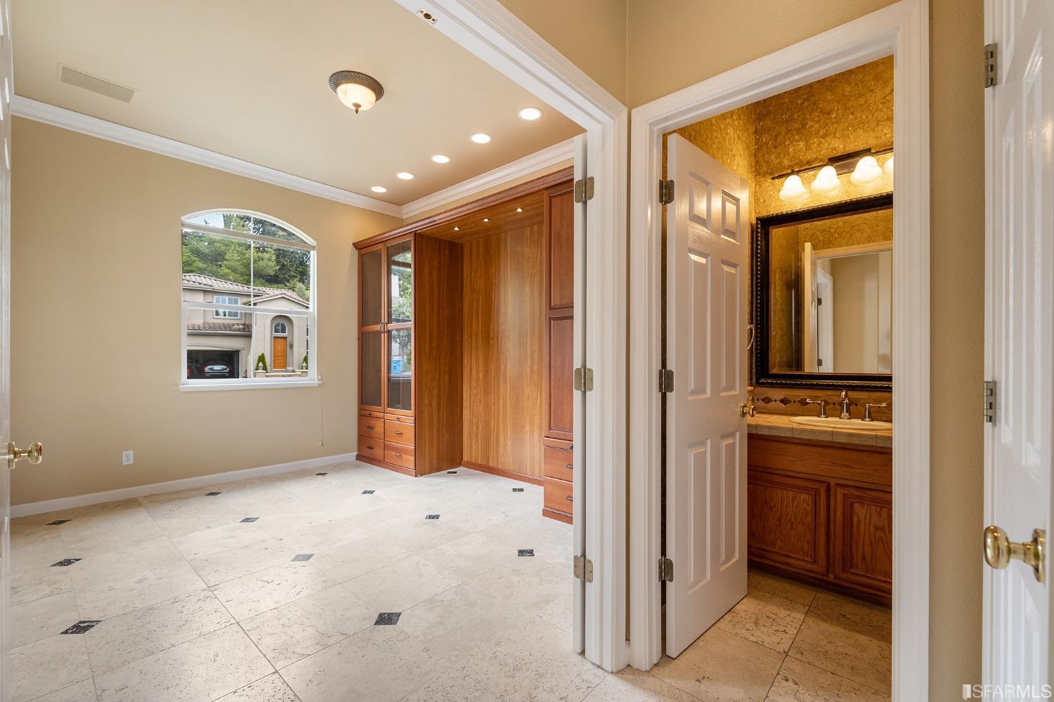 211 Sunset Court Pacifica, CA 94044 - Photo 41 of 84 a view of an empty room with a window and a kitchen