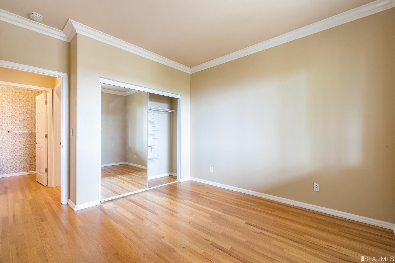 211 Sunset Court Pacifica, CA 94044 - Photo 71 of 84 a view of an empty room with wooden floor