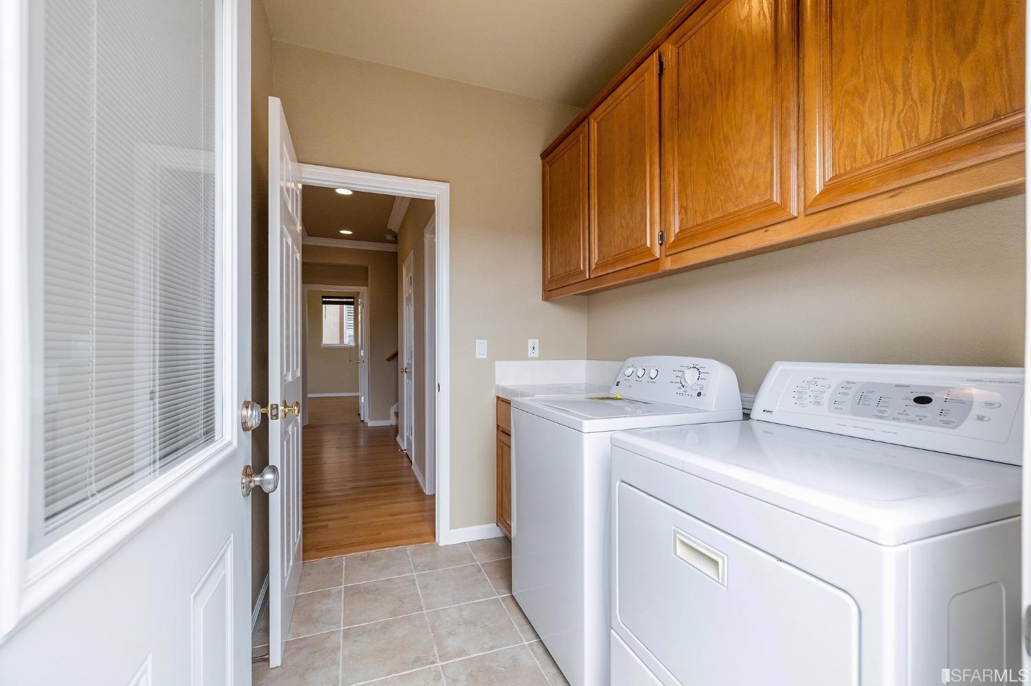 211 Sunset Court Pacifica, CA 94044 - Photo 78 of 84 a utility room with dryer and washer