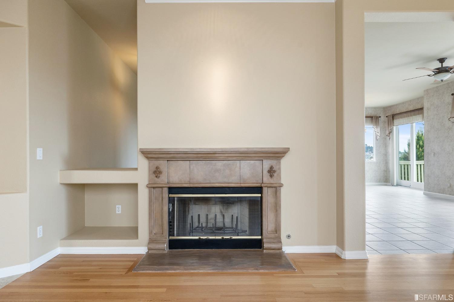 211 Sunset Court Pacifica, CA 94044 - Photo 9 of 84 a living room with a fireplace