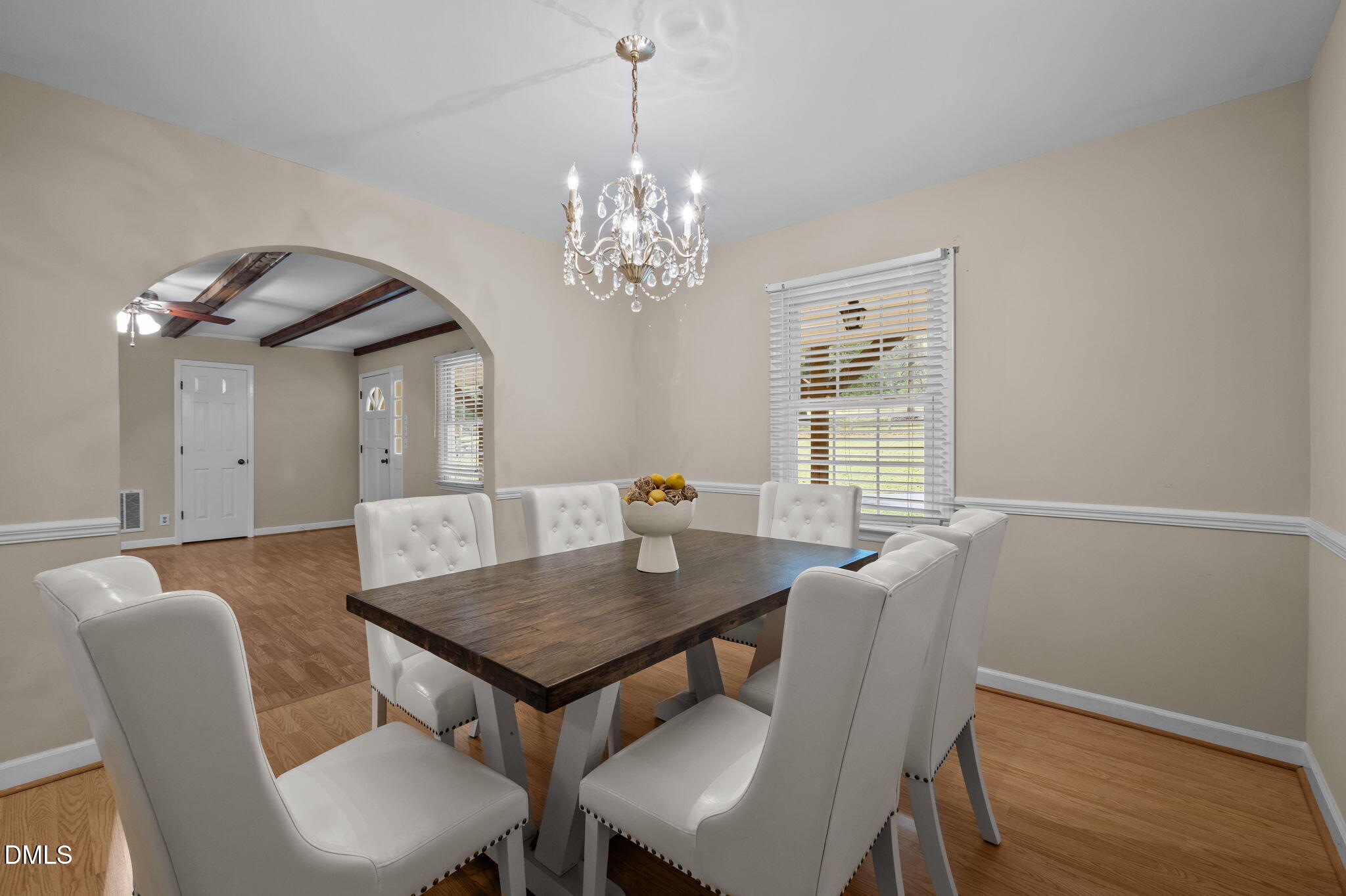 7105 Guess Road Hillsborough, NC 27278 - Photo 12 of 47 a view of a dining room with furniture window and wooden floor