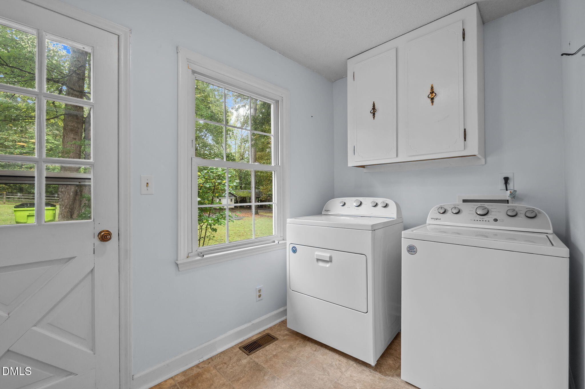 7105 Guess Road Hillsborough, NC 27278 - Photo 20 of 47 a utility room with dryer and washer