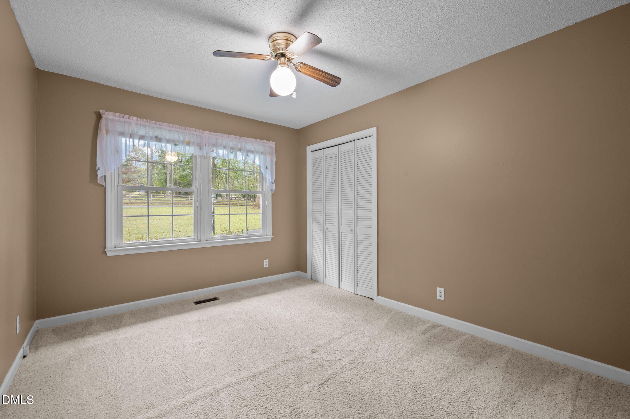 7105 Guess Road Hillsborough, NC 27278 - Photo 22 of 47 a view of an empty room with a window