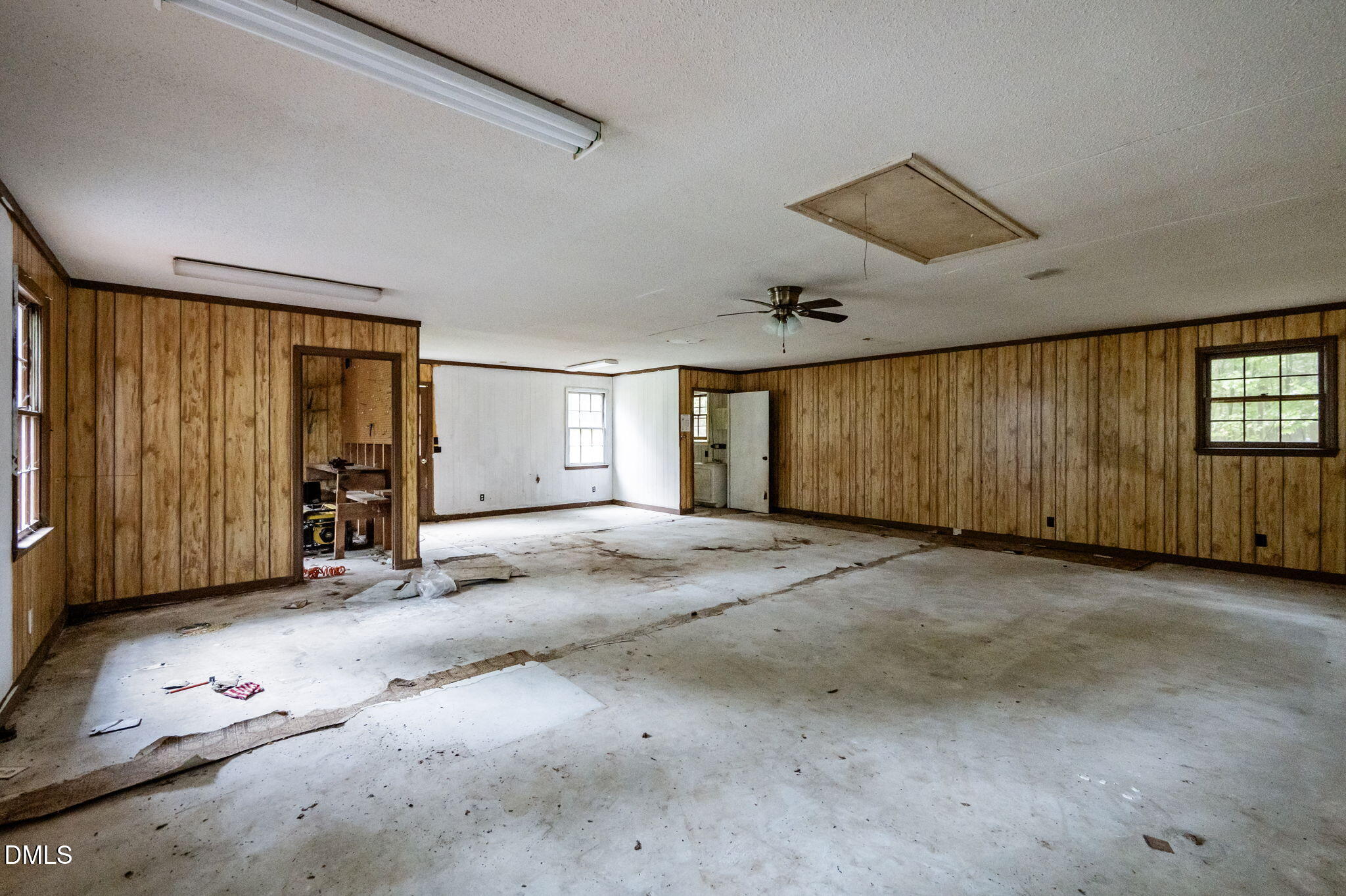 7105 Guess Road Hillsborough, NC 27278 - Photo 35 of 47 a view of a livingroom with wooden floor and windows
