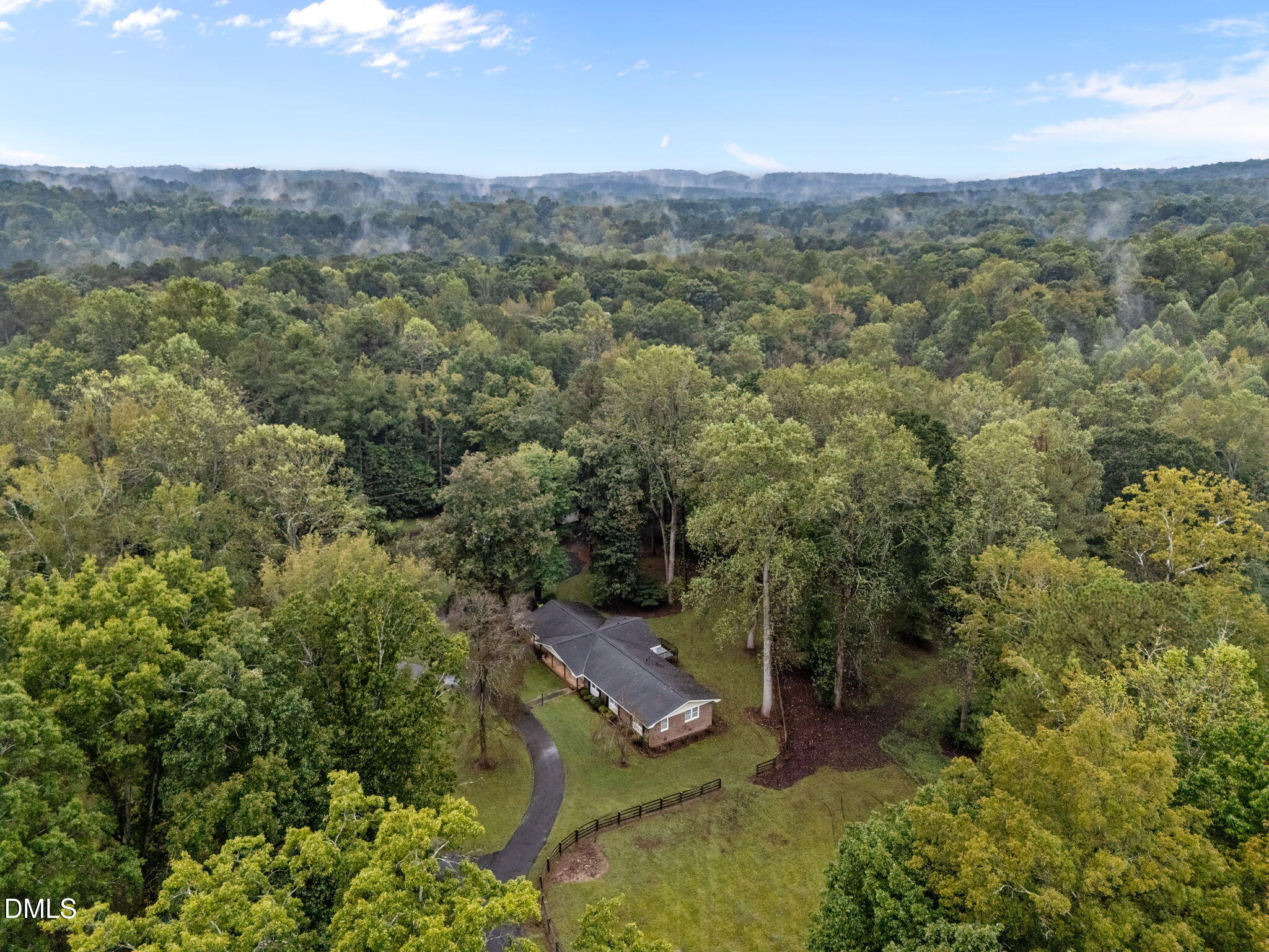 7105 Guess Road Hillsborough, NC 27278 - Photo 43 of 47 an aerial view of a house with a yard