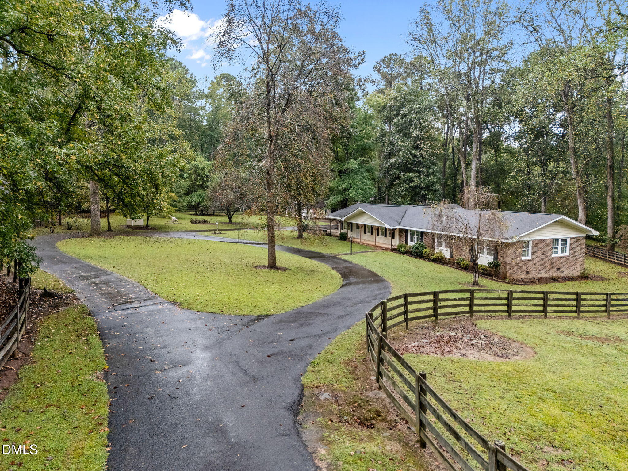 7105 Guess Road Hillsborough, NC 27278 - Photo 4 of 47 an aerial view of a house with swimming pool