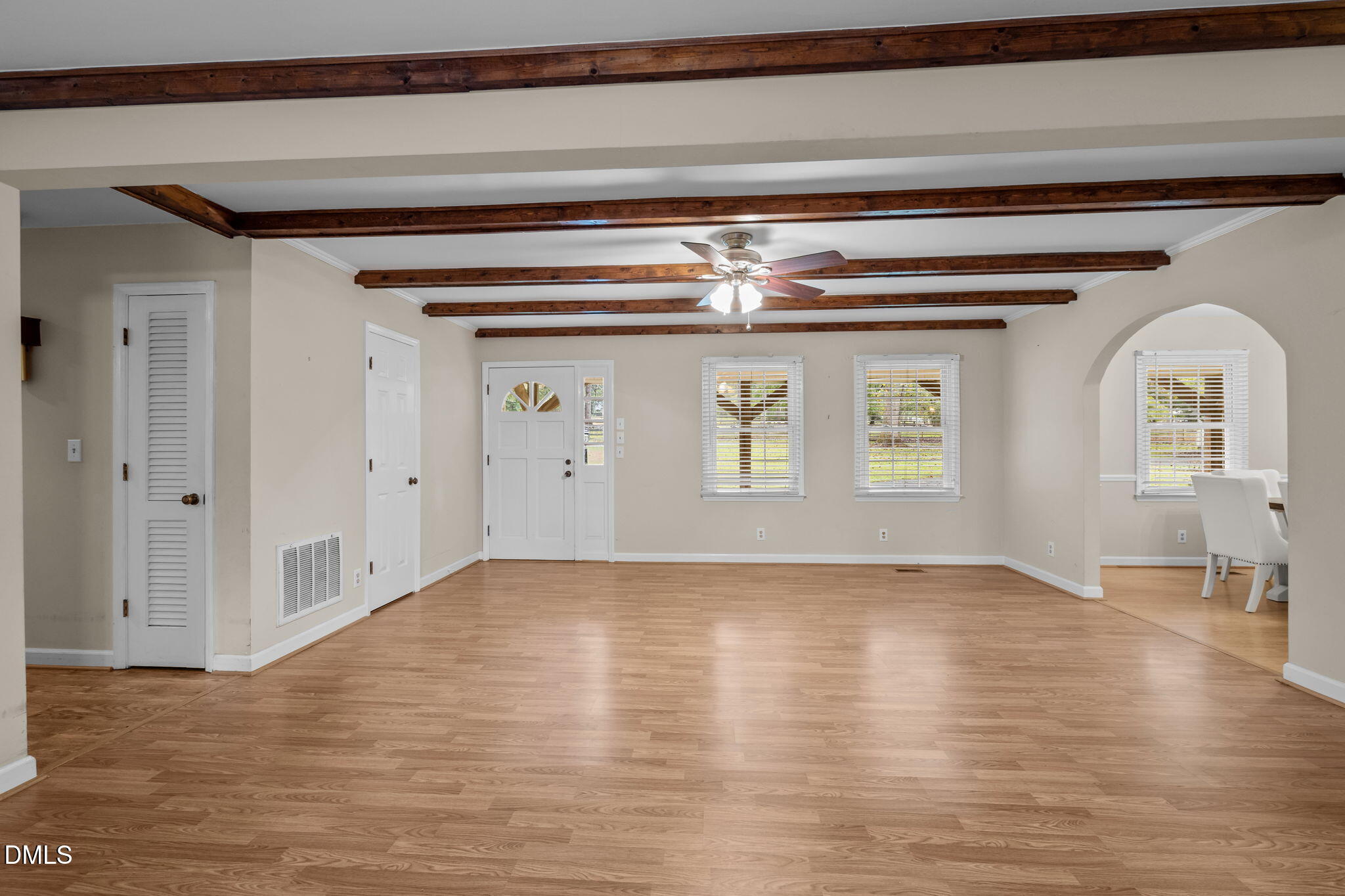 7105 Guess Road Hillsborough, NC 27278 - Photo 8 of 47 a view of empty room with wooden floor and fan