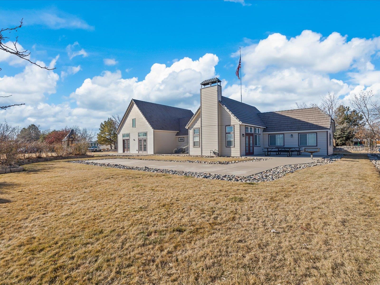 435 32 Road, Unit 713 Clifton, CO 81520 - Photo 17 of 17 a view of a house with a yard