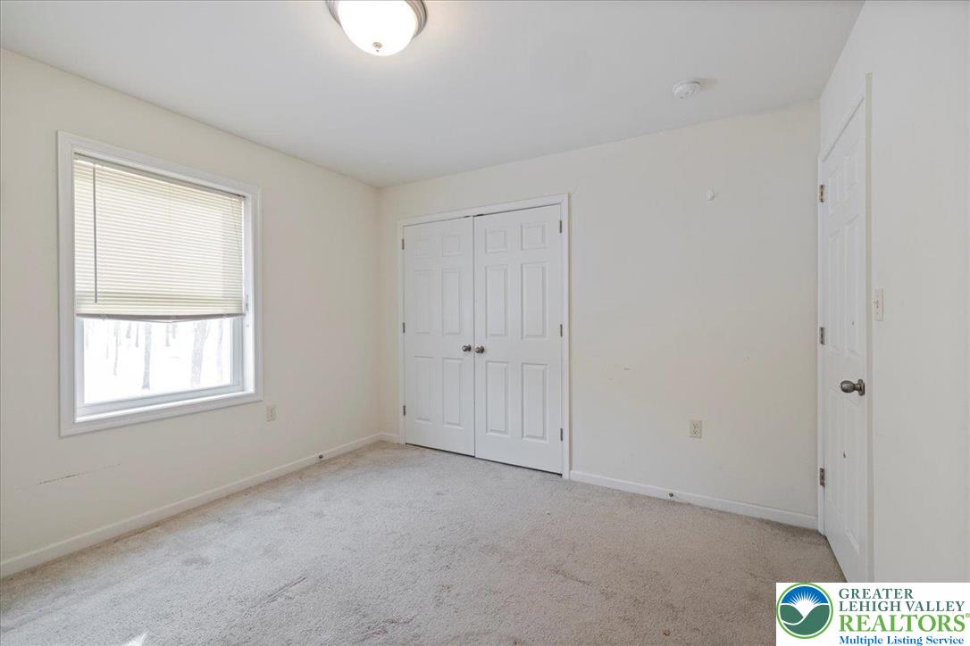 209 Buck Road East Stroudsburg, PA 18302 - Photo 14 of 25 an empty room with windows