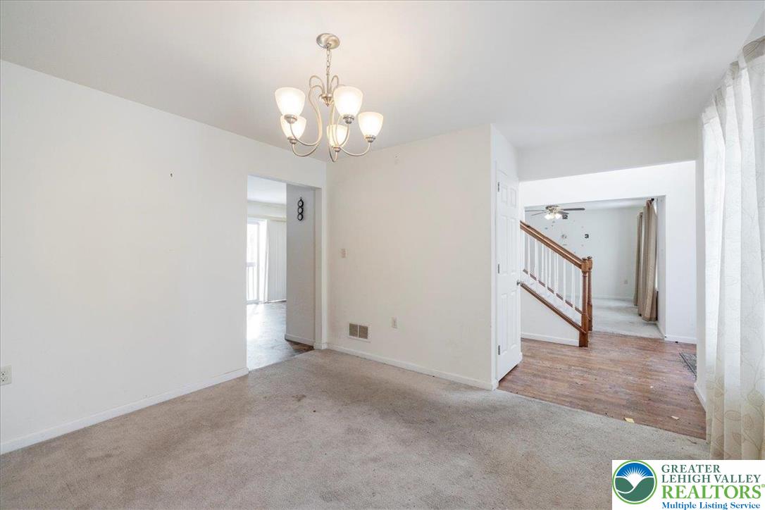 209 Buck Road East Stroudsburg, PA 18302 - Photo 6 of 25 wooden floor in an empty room with a window