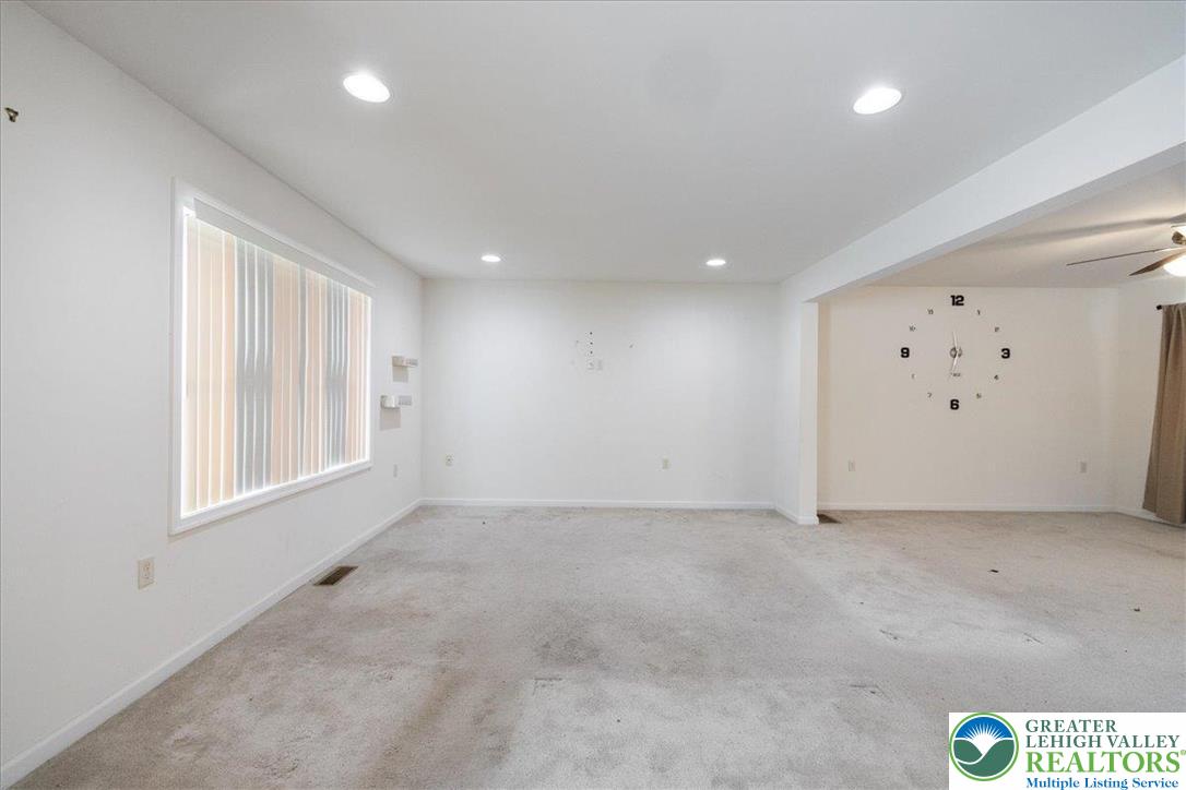 209 Buck Road East Stroudsburg, PA 18302 - Photo 7 of 25 an empty room with windows