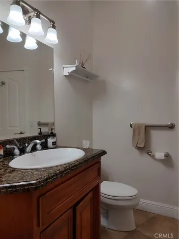 a bedroom with bed and window