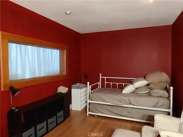 a kitchen with granite countertop a sink stove and cabinets