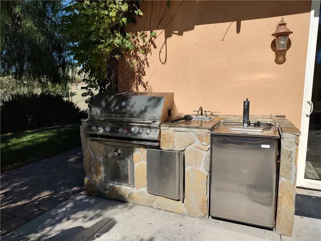a view of a back yard of the house