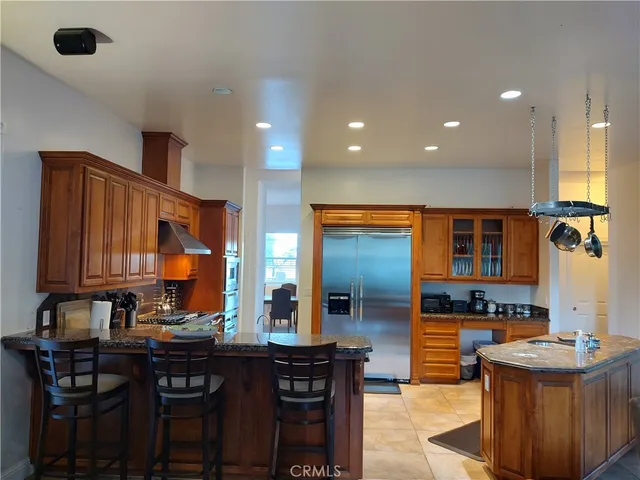 a dining room with furniture and a fireplace