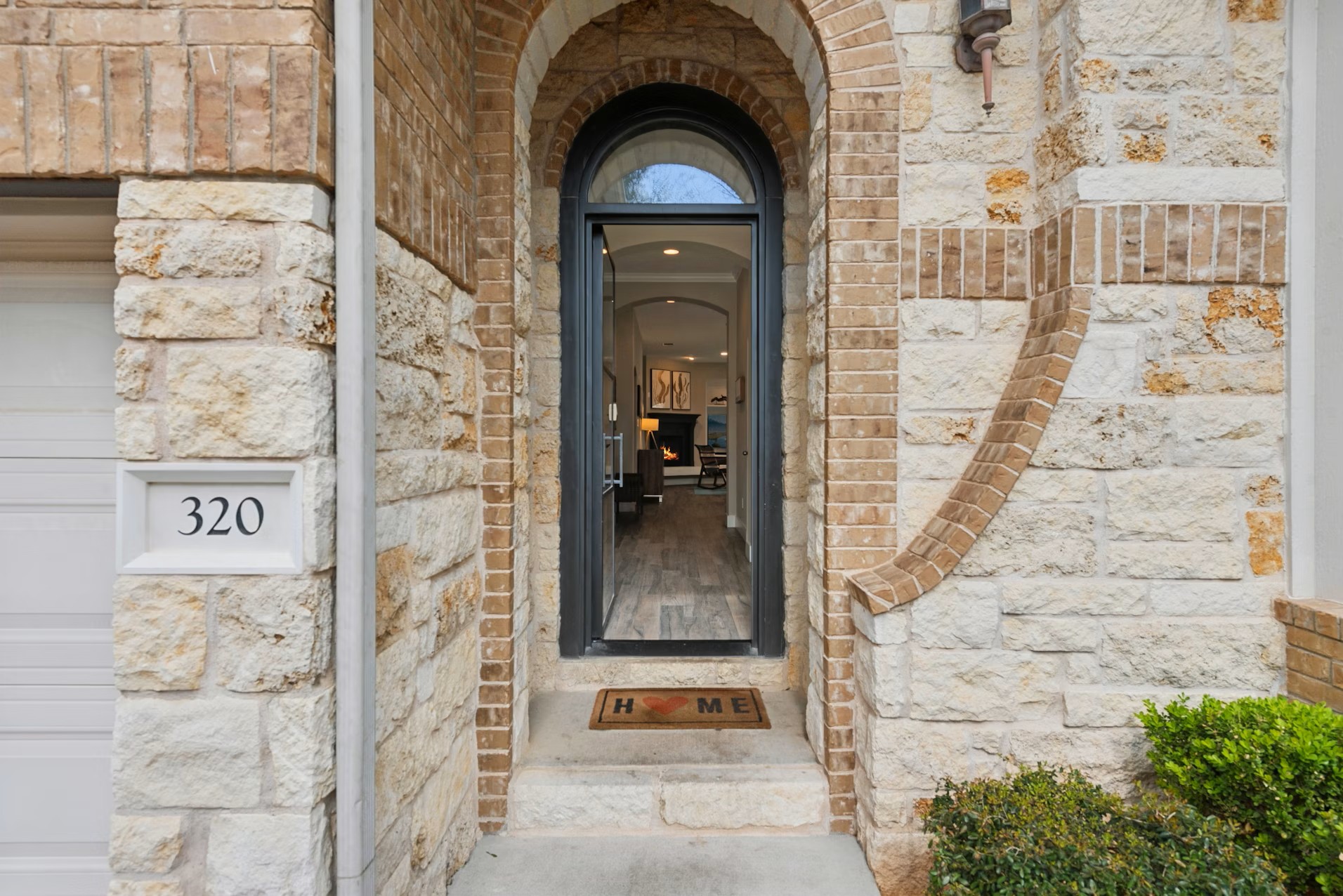 320 El Socorro Lane Austin, TX 78732 - Photo 12 of 40 a view of a entryway door
