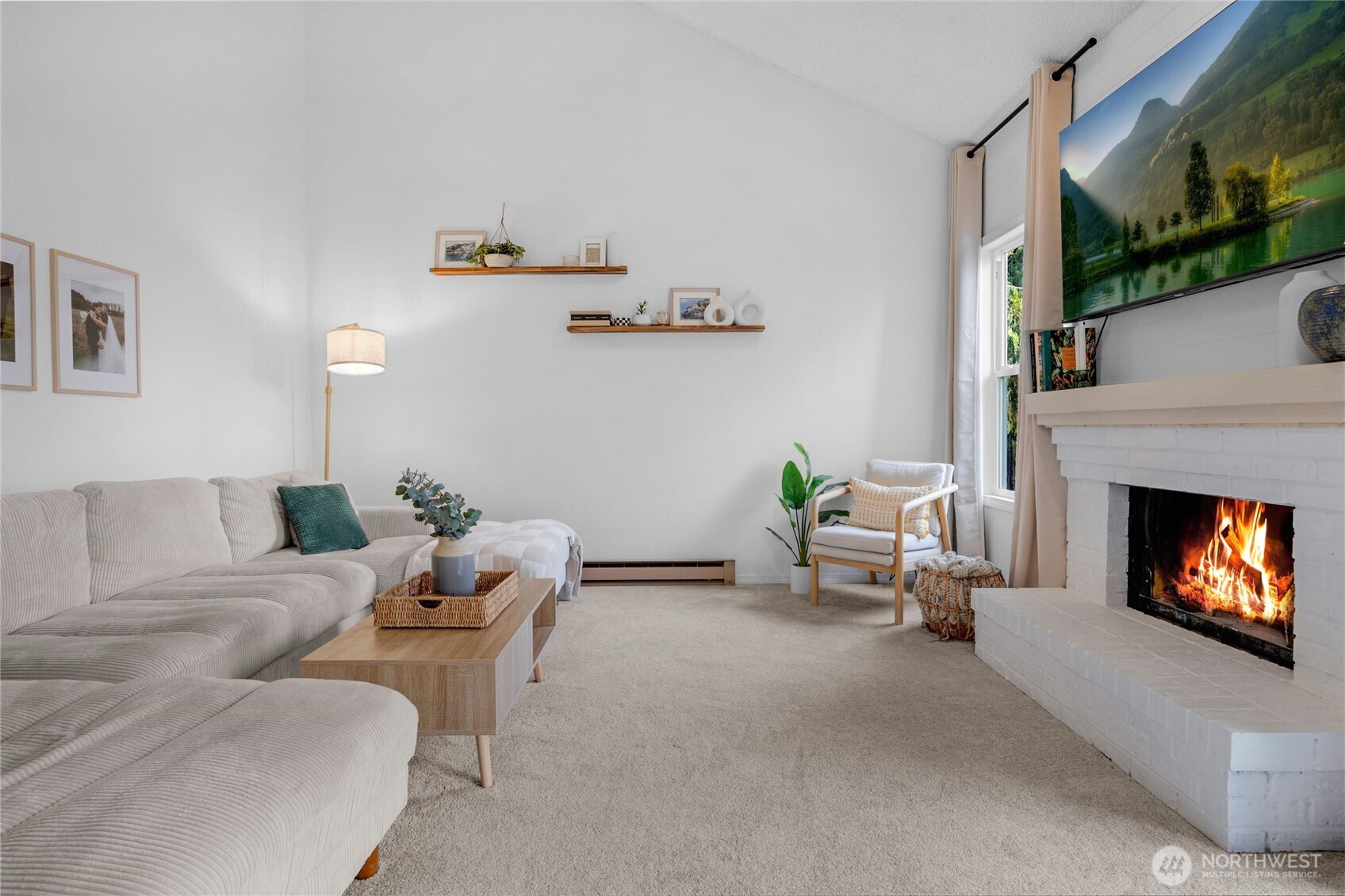820 Cady Road, Unit A305 Everett, WA 98203 - Photo 2 of 33 a living room with furniture and a fireplace