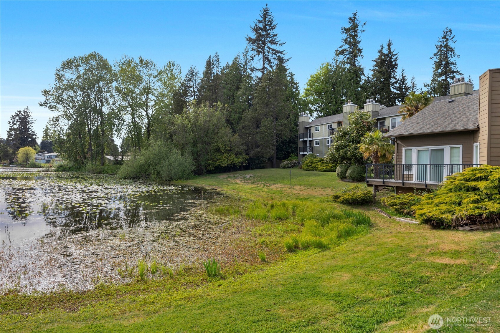 820 Cady Road, Unit A305 Everett, WA 98203 - Photo 25 of 33 a view of a garden with a house