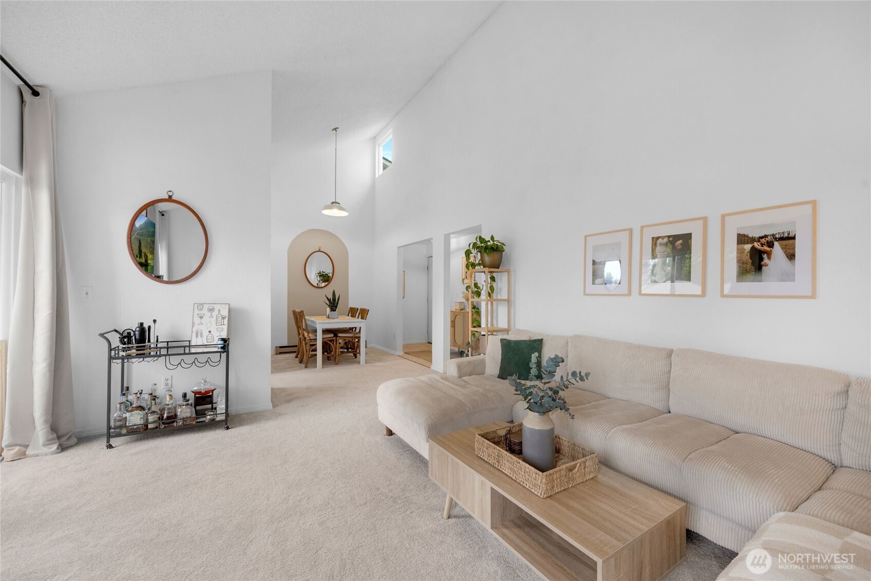 820 Cady Road, Unit A305 Everett, WA 98203 - Photo 3 of 33 a living room with furniture a mirror and glass door