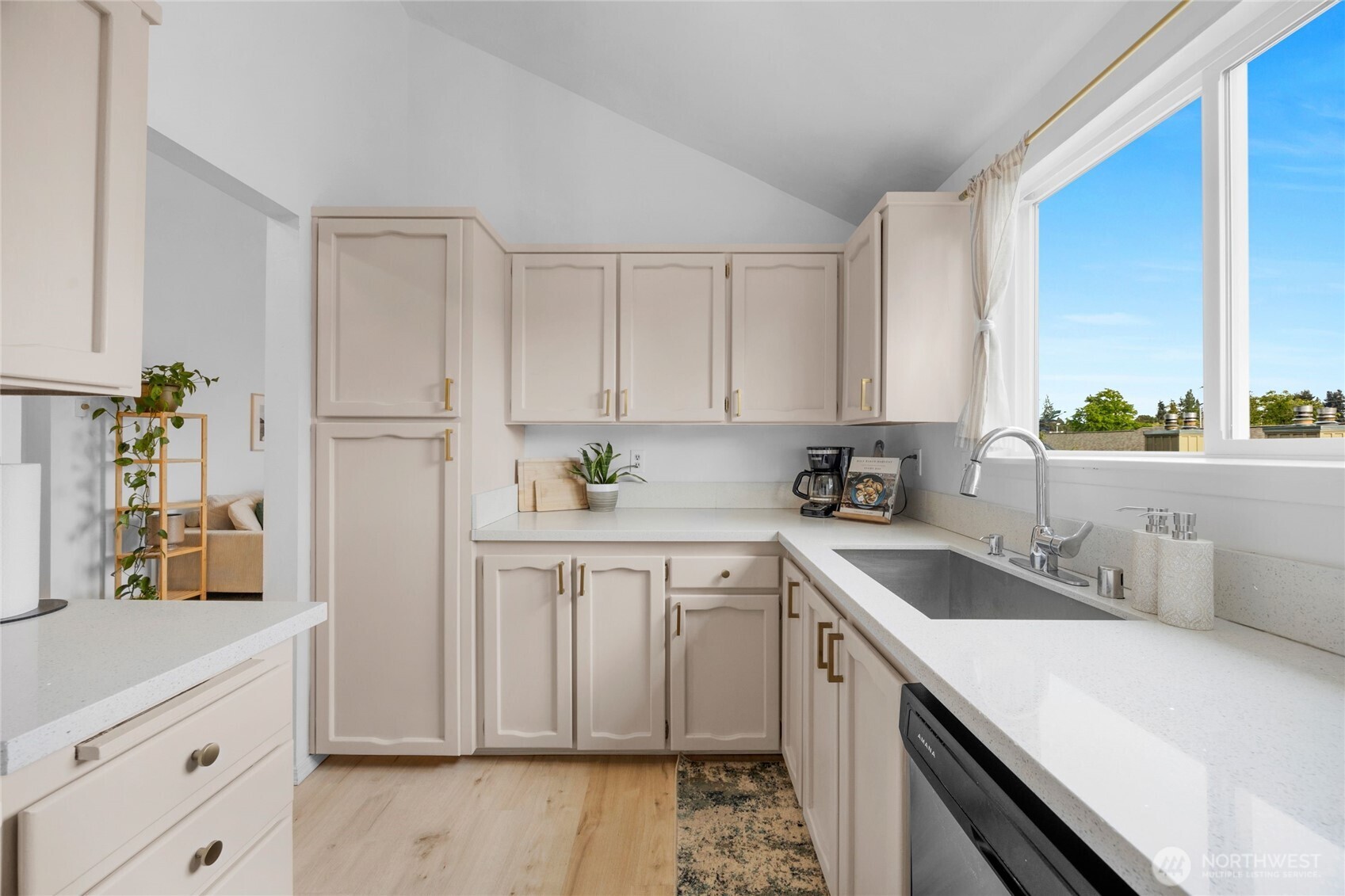 820 Cady Road, Unit A305 Everett, WA 98203 - Photo 5 of 33 a kitchen with white cabinets and white appliances