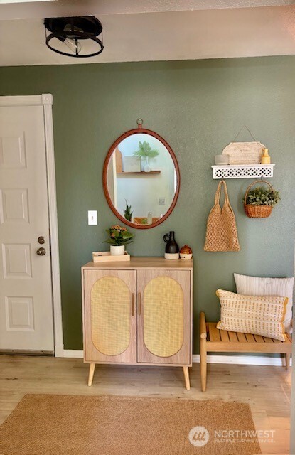 820 Cady Road, Unit A305 Everett, WA 98203 - Photo 10 of 33 a living room with a couch and a table