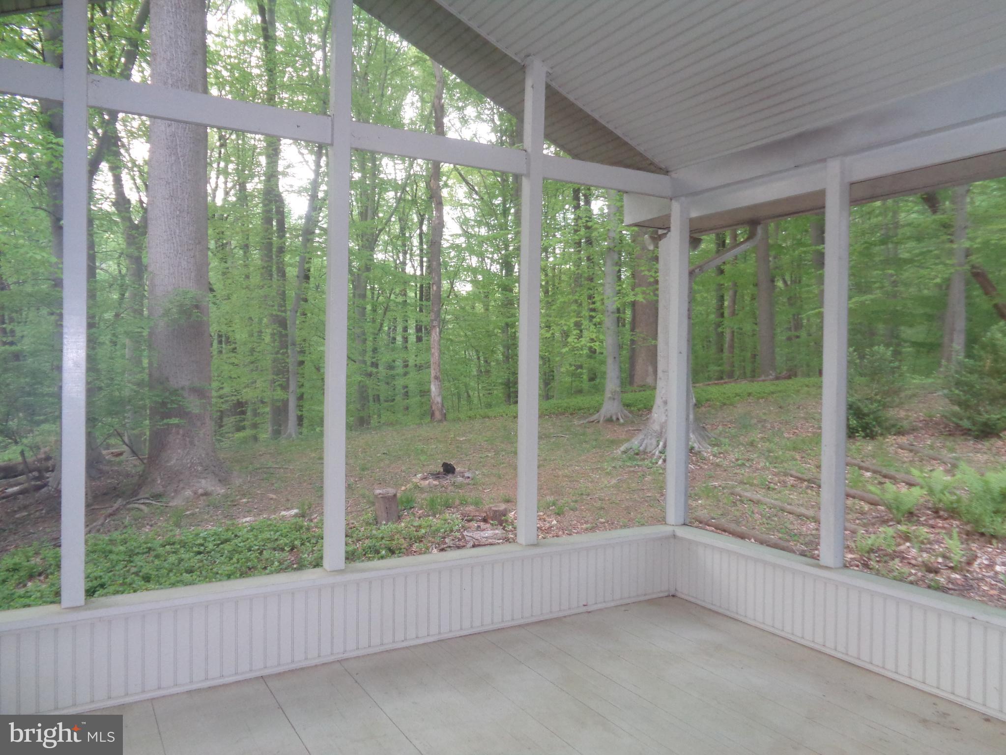 1616 Dogwood Hill Road Towson, MD 21286 - Photo 15 of 55 The best room in the house- the screened porch!