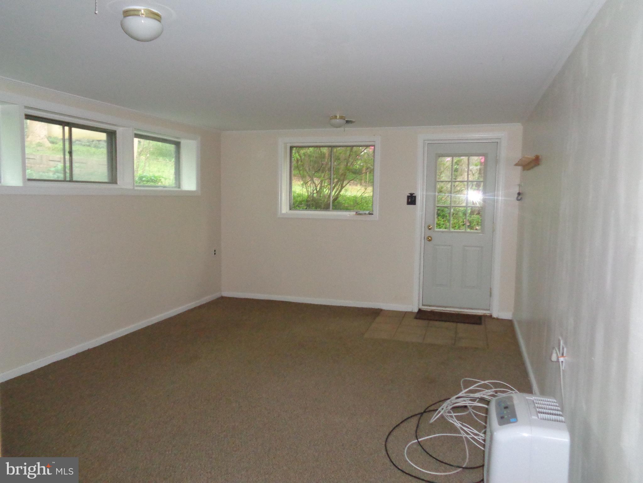 1616 Dogwood Hill Road Towson, MD 21286 - Photo 28 of 55 Family Room off Driveway, Side Entrance