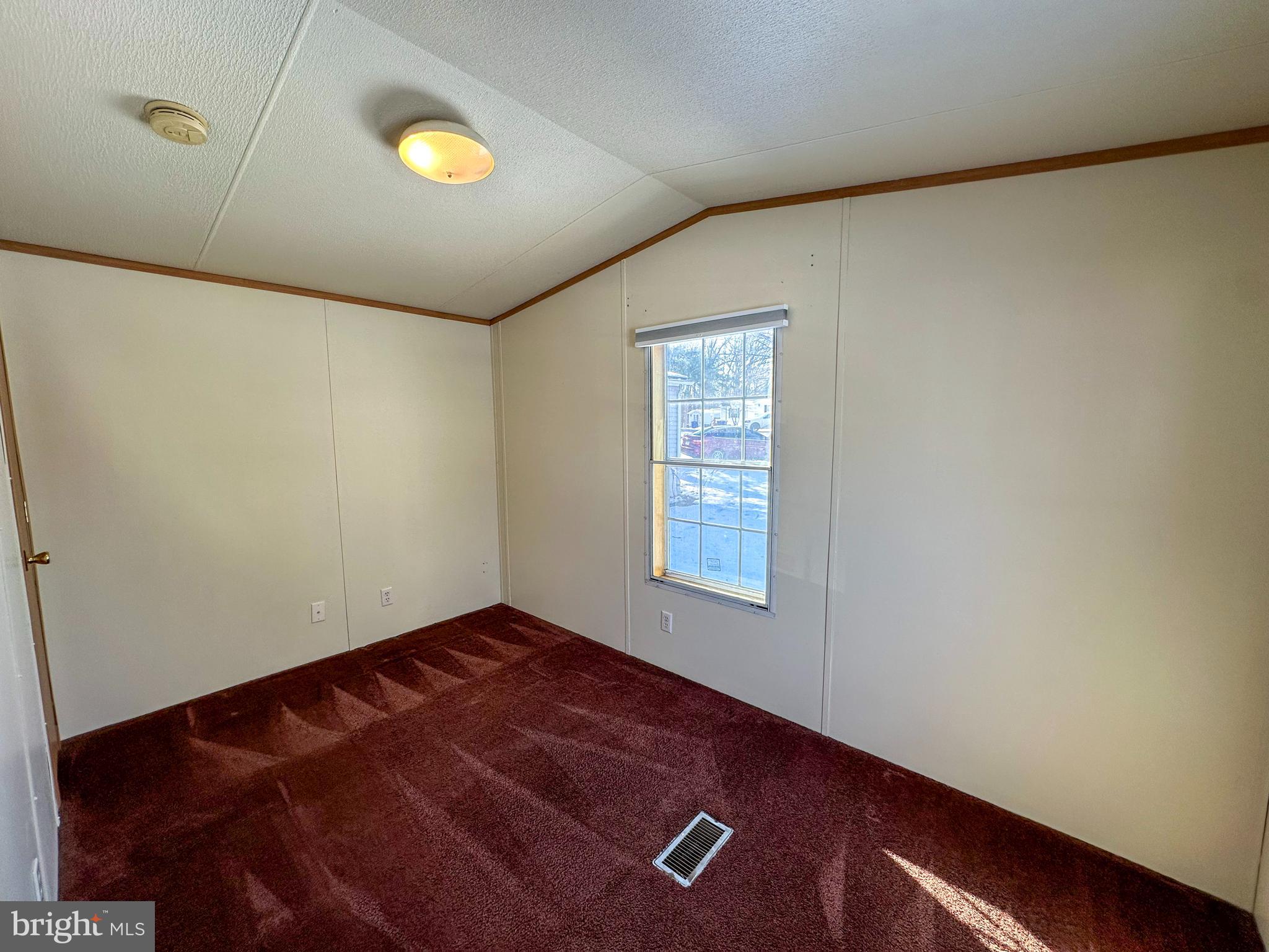 760 Azalea Lane Gap, PA 17527 - Photo 32 of 32 an empty room with a ceiling fan and window