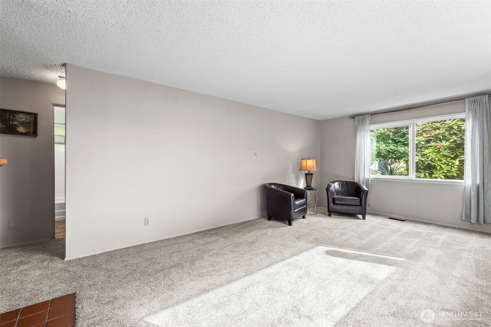 4403 Paradise Avenue West University Place, WA 98466 - Photo 12 of 35 a living room with furniture and a window