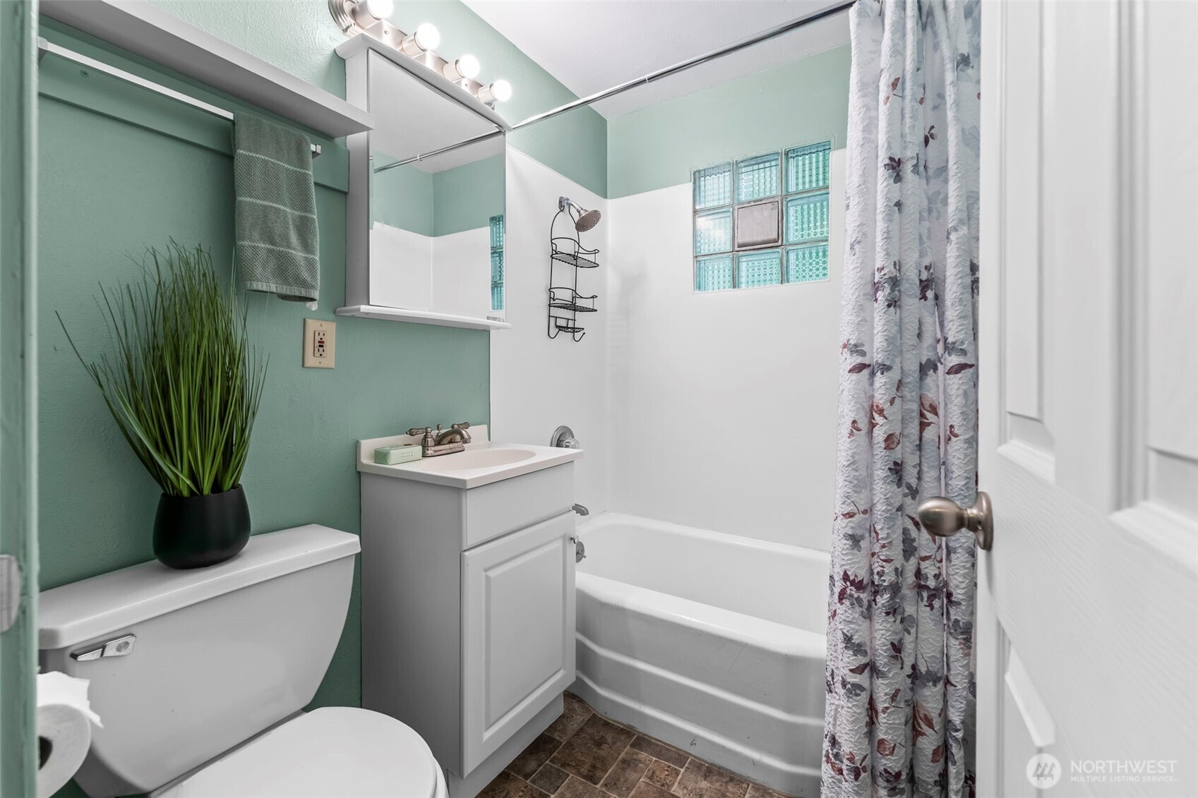 4403 Paradise Avenue West University Place, WA 98466 - Photo 20 of 35 a bathroom with a sink toilet and shower