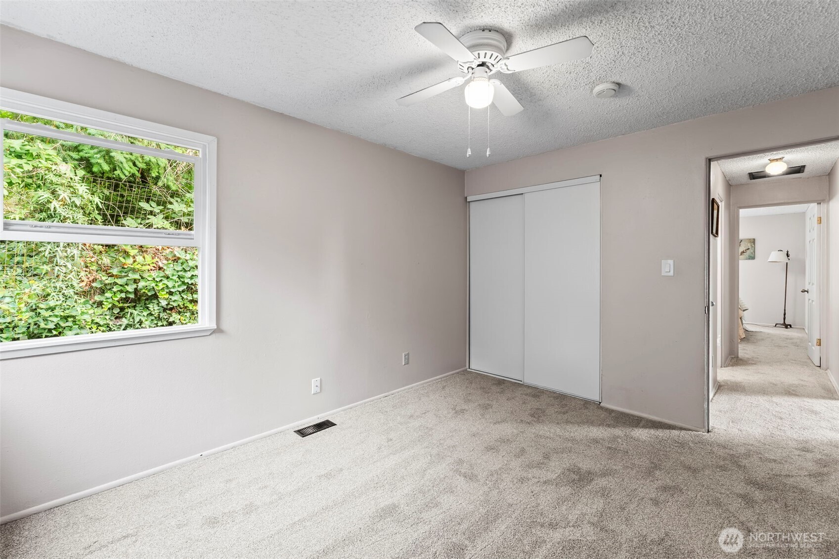 4403 Paradise Avenue West University Place, WA 98466 - Photo 25 of 35 wooden floor in an empty room with a window