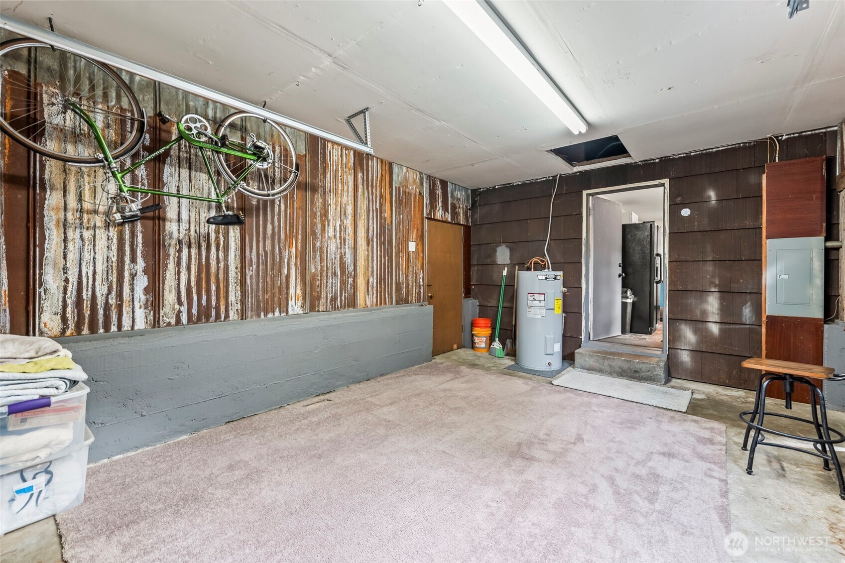 4403 Paradise Avenue West University Place, WA 98466 - Photo 27 of 35 a view of an empty room with wooden floor and windows