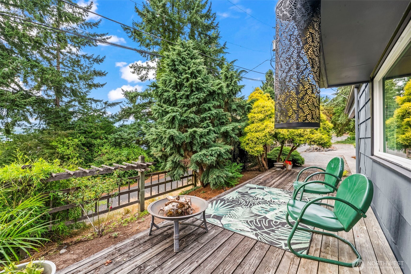 4403 Paradise Avenue West University Place, WA 98466 - Photo 31 of 35 a view of balcony with wooden floor and outdoor seating