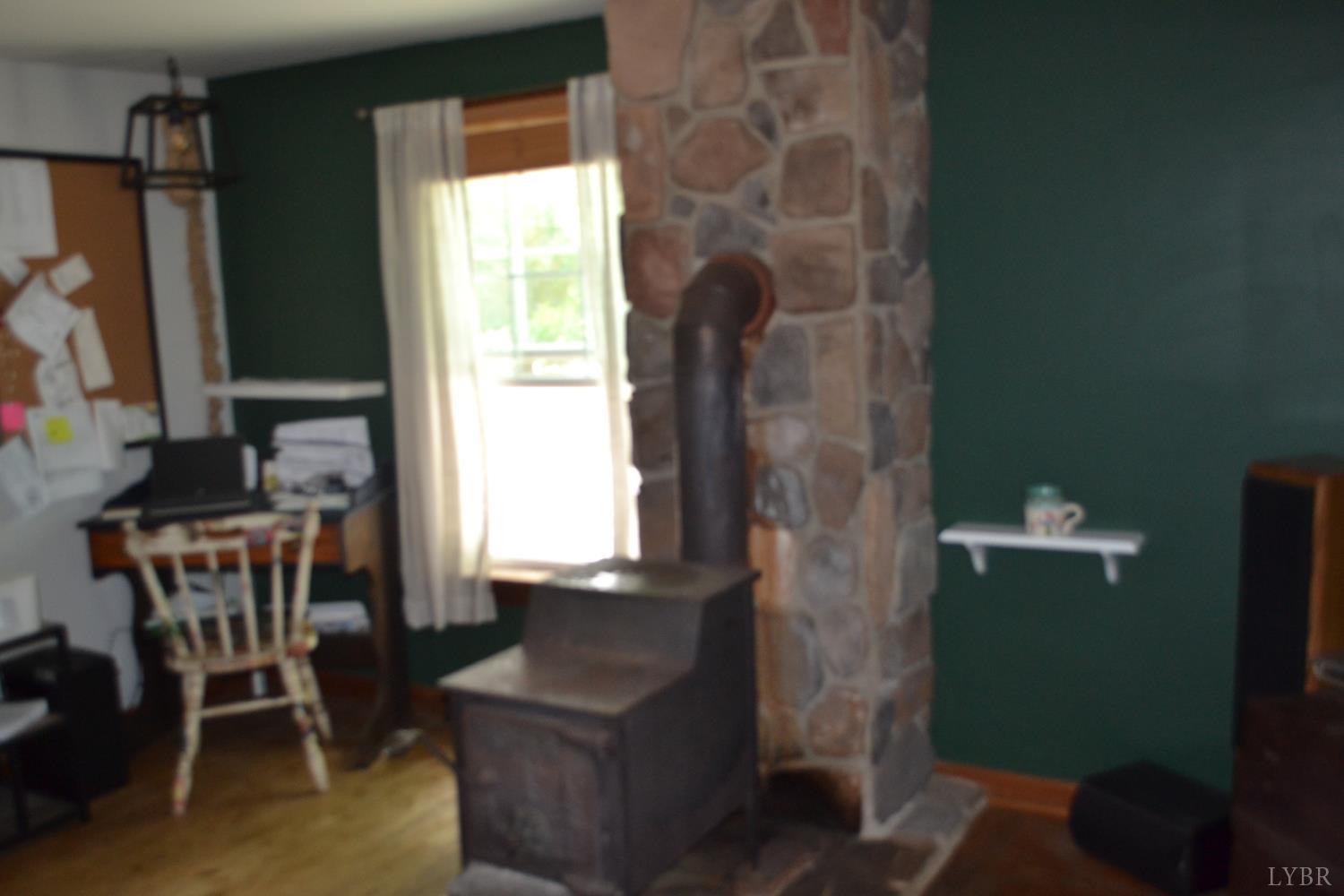 6387 Red House Road Rustburg, VA 24588 - Photo 18 of 38 a workspace with furniture and a window